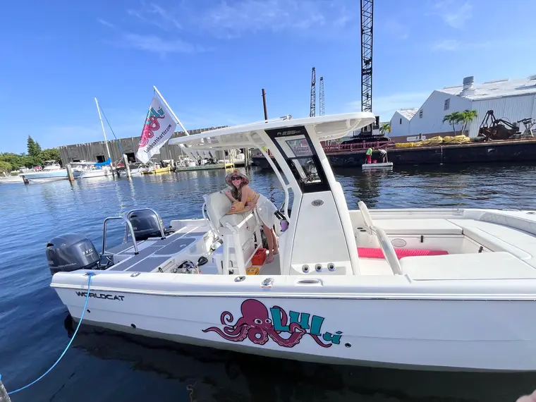 The Lulu, a WorldCat center console with octopus graphics, docked in South Florida