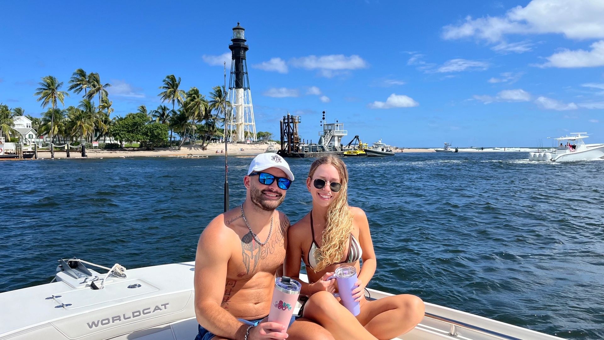 Couple at Hillsboro Lighthouse on a South Florida intracoastal cruise